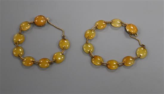 An Edwardian yellow metal and yellow agate choker necklace, which converts into two bracelets, overall length 37cm.